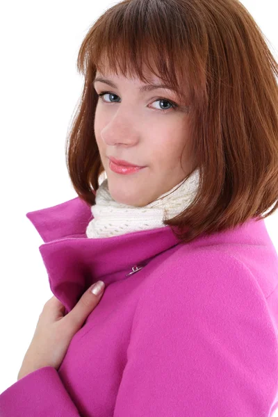 Cute woman in pink coat over white — Stock Photo, Image