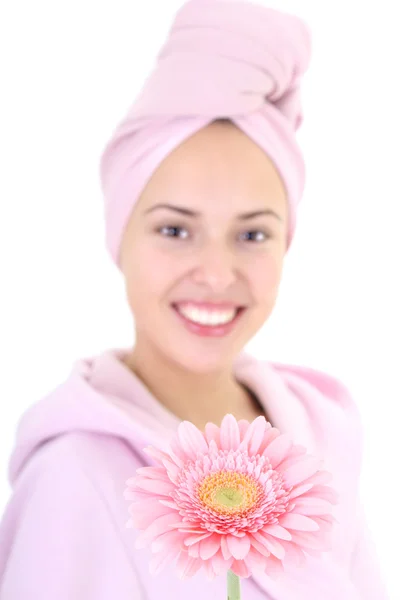 Young beautiful woman in bathrobe with gerberas — Stock Photo, Image