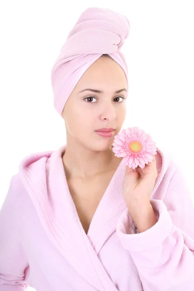 Young beautiful woman in bathrobe with gerberas — Stock Photo, Image