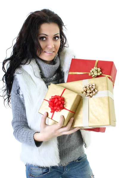 Attractive woman in fur vest with presents — Stock Photo, Image