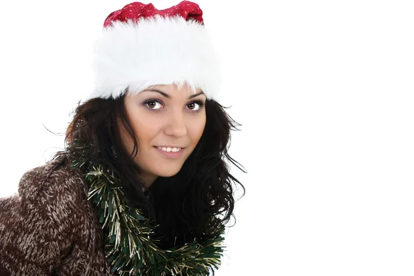 Aantrekkelijk meisje in Kerstman hoed — Stockfoto
