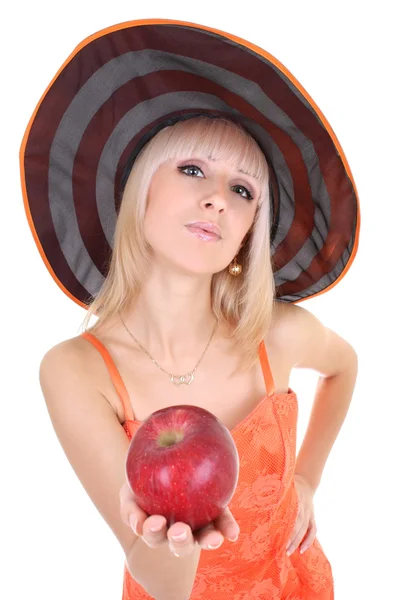 Apple de la jeune femme séduisante en donnant du chapeau rouge — Photo