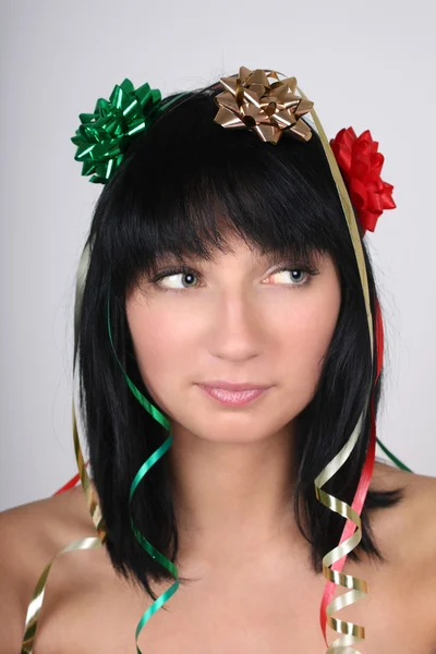 Young woman with bow on head — Stock Photo, Image