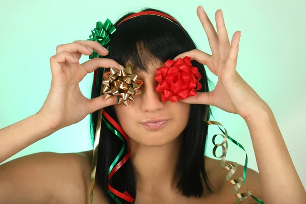 Woman face with bows instead of her eyes — Stock Photo, Image