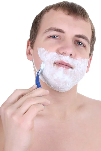 Młody człowiek do golenia z brzytwa — Zdjęcie stockowe