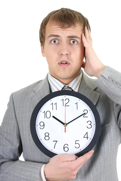 Shoked biznesmen posiadania zegar — Zdjęcie stockowe