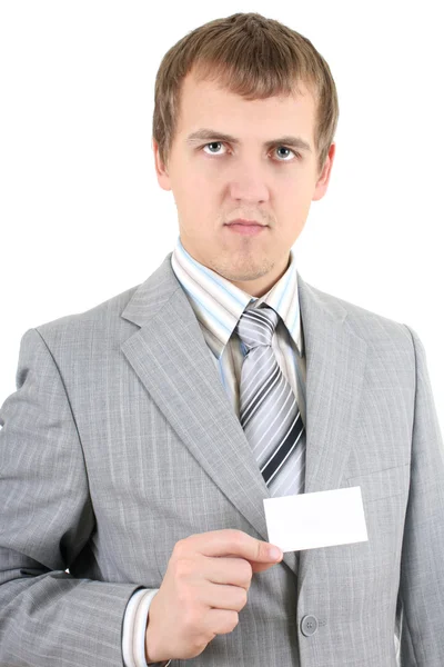 Joven empresario mostrando una tarjeta de visita en blanco — Foto de Stock