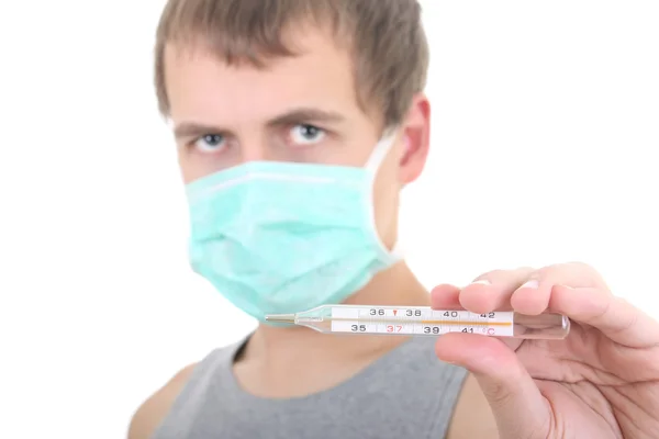 Young man in protective mask with thermometer — Stock Photo, Image