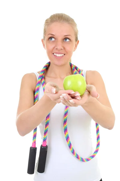 Dreaming girl with skipping rope and apple — Stock Photo, Image