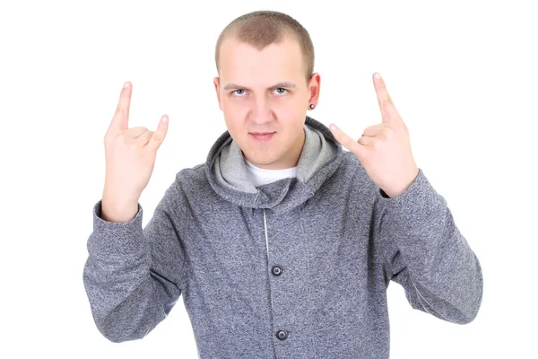 Young man doing a rock and roll symbol — Stock Photo, Image