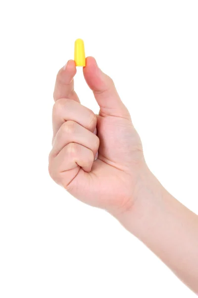 Ear plug in male hand — Stock Photo, Image