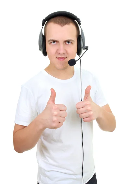 Helpline telephone operator showing thumb up over white — Stock Photo, Image