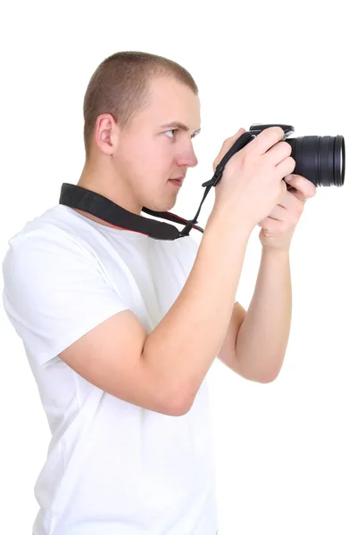 Молодой фотограф с камерой — стоковое фото
