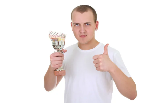 Uomo con coppa e soldi mostrando pollice sopra bianco — Foto Stock