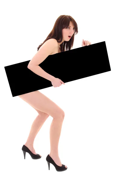 Amazed naked woman with black billboard — Stock Photo, Image