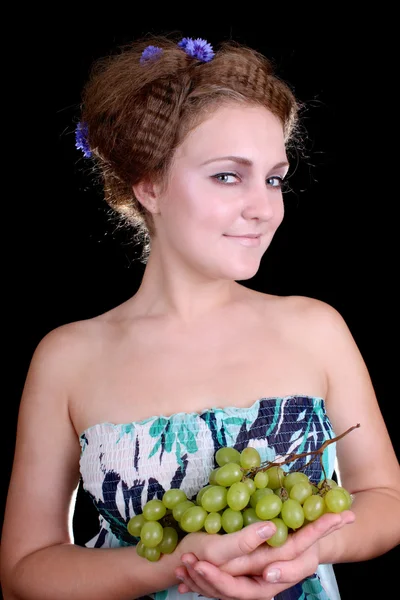Szczęśliwa kobieta z winogron — Zdjęcie stockowe