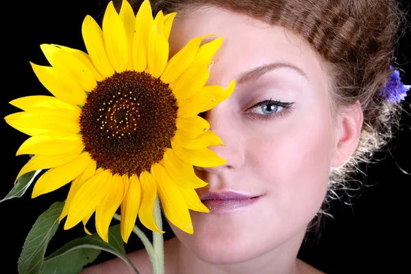 stock image Woman with sunflower