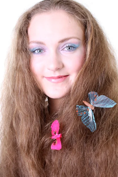 Meisje met vlinder in haar — Stockfoto