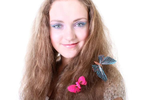 Mädchen mit Schmetterling im Haar — Stockfoto