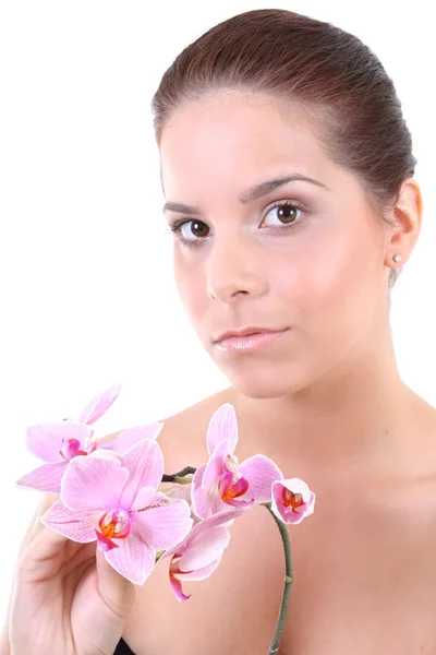 Ung vacker frisk kvinna med orkidé — Stockfoto