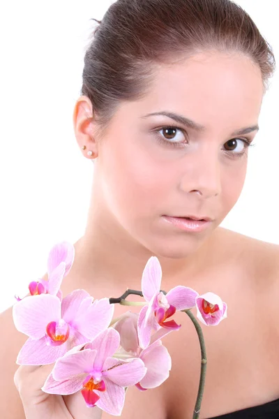 Young beautiful healthy woman with orchid — Stock Photo, Image
