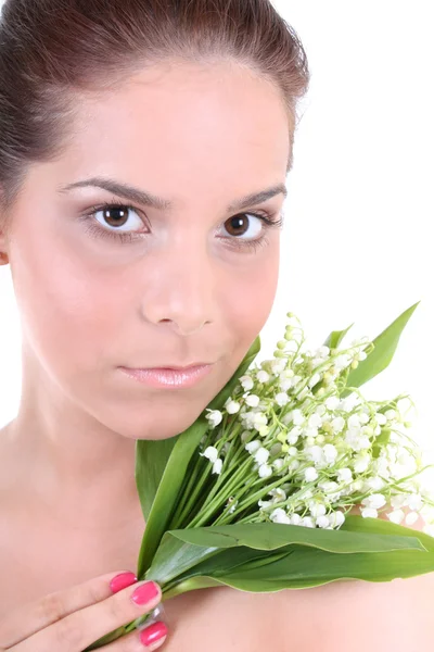 Junge schöne gesunde Frau mit Blumen — Stockfoto