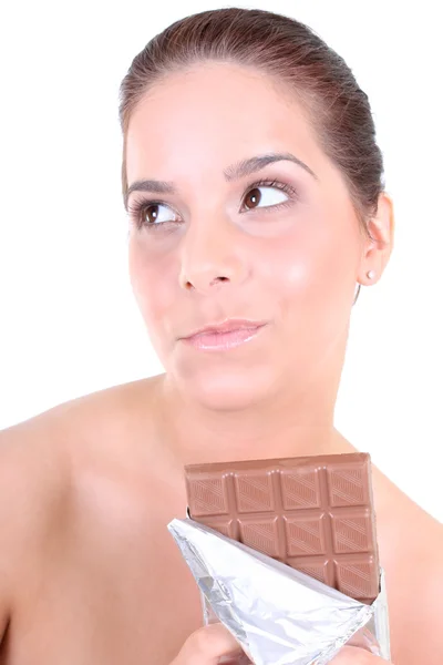 Femme mangeant du chocolat — Photo