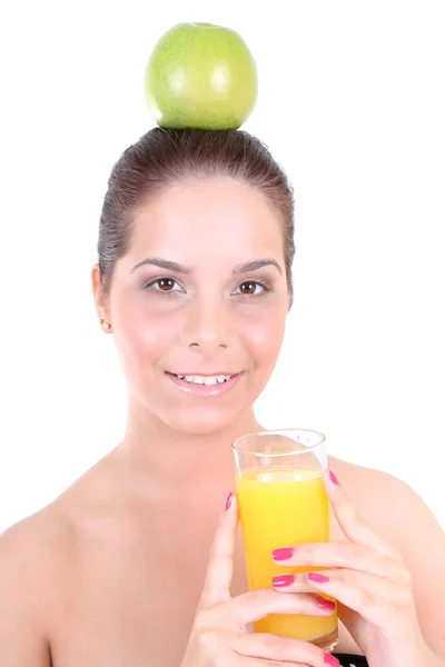 Vrouw met groene apple en glas sinaasappelsap — Stockfoto