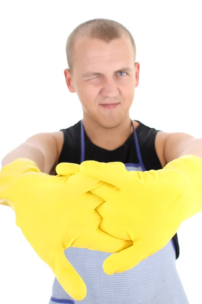 Молодой человек в желтые перчатки подмигивая — стоковое фото
