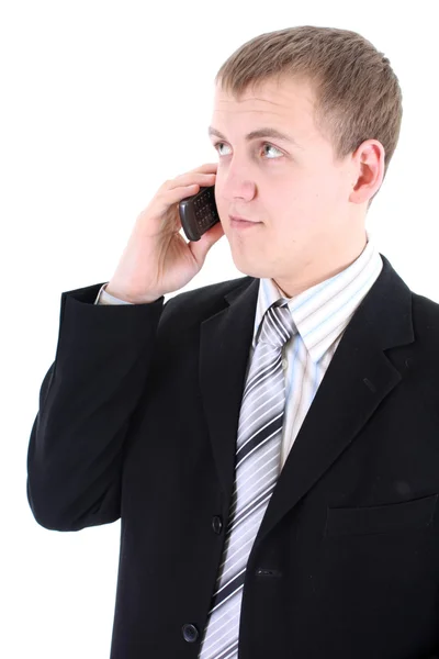 Junge Unternehmer im schwarzen Anzug mit Telefon — Stockfoto