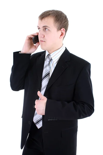 Junge Unternehmer im schwarzen Anzug mit Telefon — Stockfoto