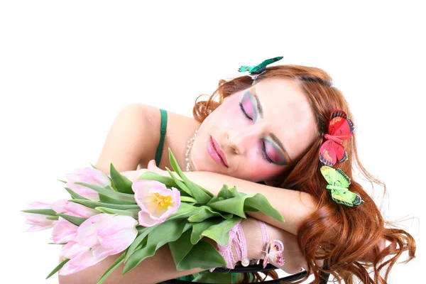 Red-haired woman with flowers and butterflies on her head — Stock Photo, Image