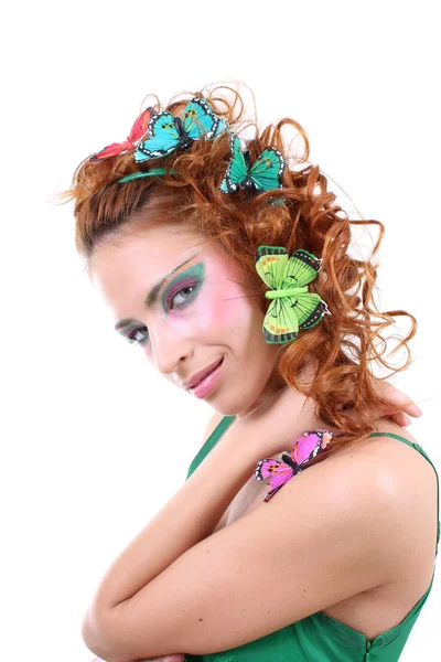 Red-haired woman with butterflies on her head — Stock Photo, Image