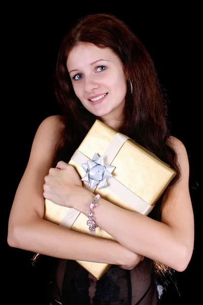 Attractive woman with gift — Stock Photo, Image
