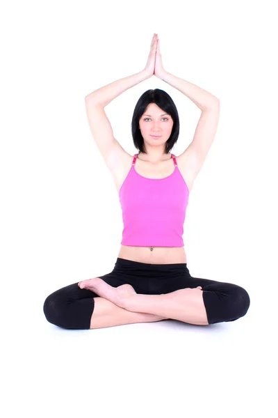 Kobieta w kolorze różowym, robienie yoga — Zdjęcie stockowe