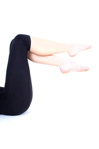 Bella lunga flessione gambe femminile — Foto Stock