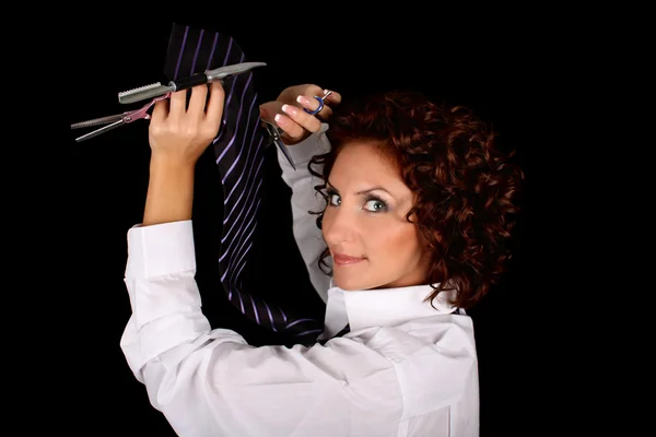 Hair stylist with scissors over black — Stock Photo, Image