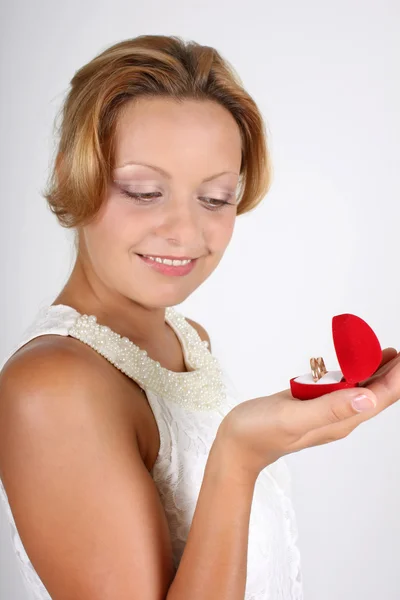 Woman with wedding rings — Stock Photo, Image