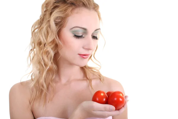 Porträt einer jungen Frau mit Tomaten — Stockfoto