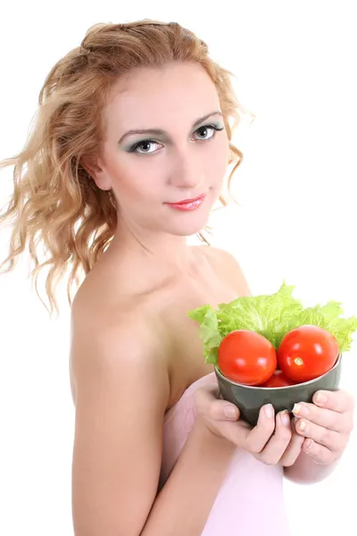 Jonge vrouw met groene salade een tomaten — Foto de Stock