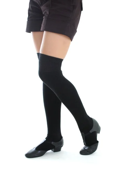 Kobiece nogi w kneesocks — Zdjęcie stockowe