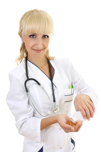 Arts vrouw in jurk met tabletten — Stockfoto