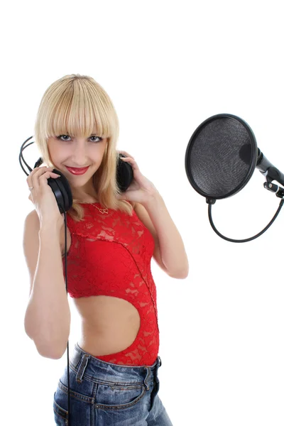 Žena s mikrofonem a sluchátky — Stock fotografie