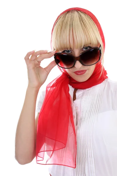 Girl in red correcting sunglasses — Stock Photo, Image