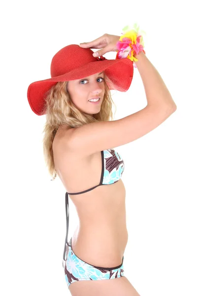 Boldog, fiatal nő, fürdőruha és piros kalapban — Stock Fotó