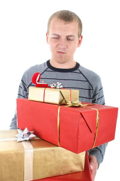 Young man with gifts Stock Photo