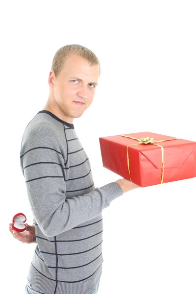 Man with gift and wedding ring Stock Picture