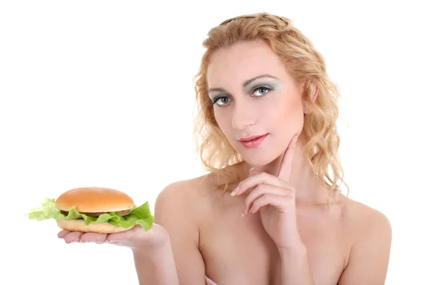 Joven hermosa mujer con hamburguesa Imágenes de stock libres de derechos