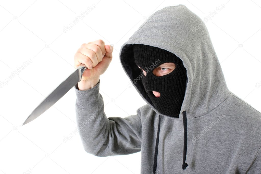 Bandit in mask with knife