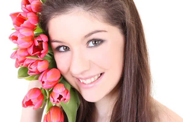 Close-up retrato de menina com tulipas cor de rosa — Fotografia de Stock